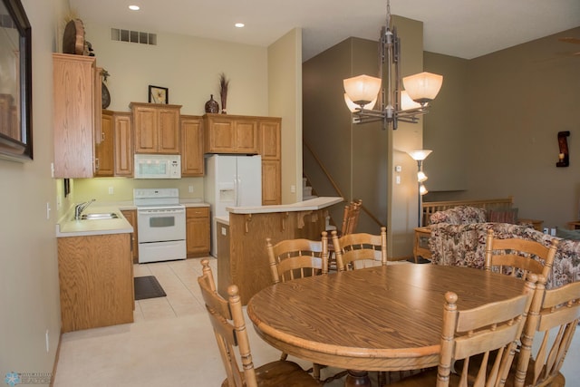 3220 40th Ave S Unit D, Fargo, ND 58104 - dining room featuring an inviting chandelier, recessed lighting, stairway, light tile patterned floors, and visible vents