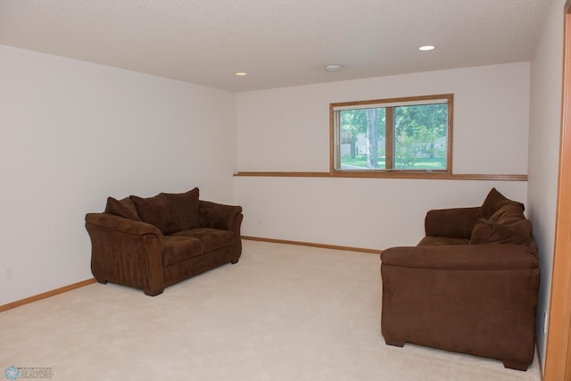 3220 40th Ave S Unit D, Fargo, ND 58104 - living area with light colored carpet, baseboards, and recessed lighting