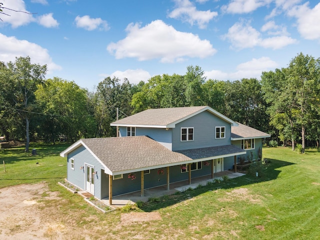 24182 184th St NW, Orrock Twp, MN 55309 - back of house with a shingled roof, a lawn, and a porch