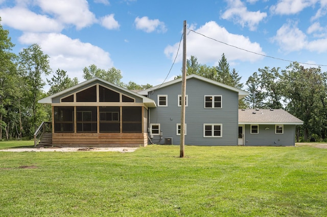 24182 184th St NW, Orrock Twp, MN 55309 - rear view of property with a sunroom and a yard