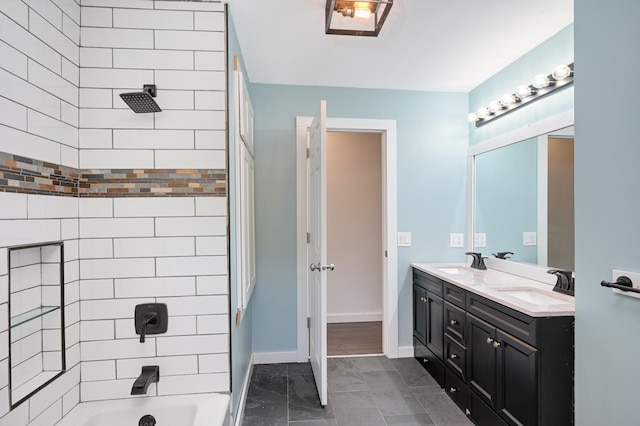 24182 184th St NW, Orrock Twp, MN 55309 - bathroom with double vanity, shower / bath combination, and baseboards