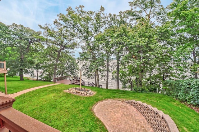 view of yard featuring a wooden deck