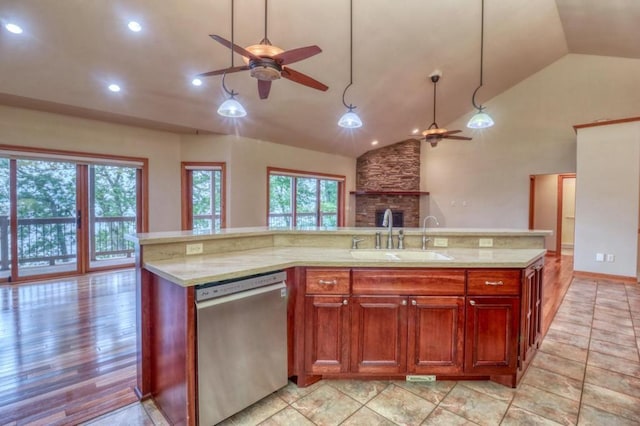 kitchen featuring a sink, ceiling fan, dishwasher, and open floor plan