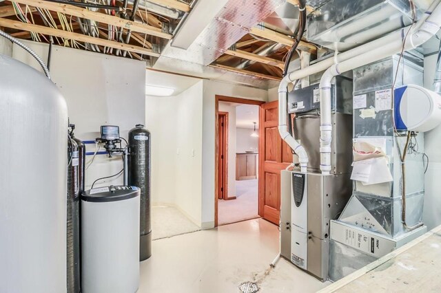 unfinished below grade area featuring heating unit