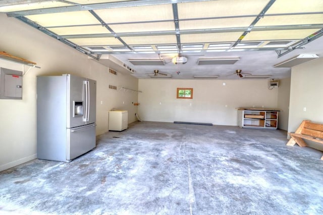 garage featuring a garage door opener, electric panel, stainless steel refrigerator with ice dispenser, and visible vents