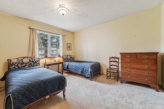 carpeted bedroom with a textured ceiling