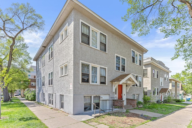 423 Fry St, Saint Paul, MN 55104 - view of front of home featuring a residential view and stucco siding