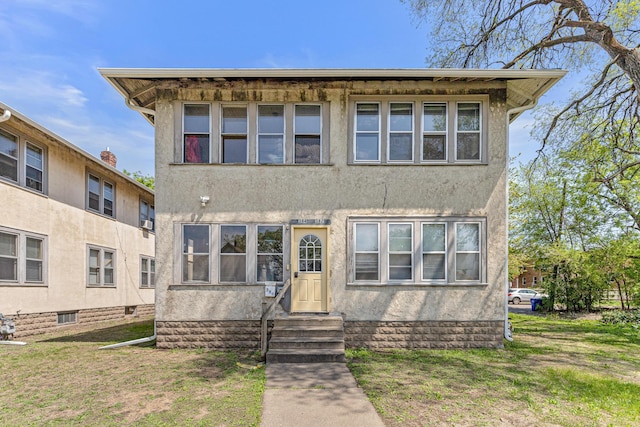 382 Fry St, Saint Paul, MN 55104 - view of front of house with entry steps and stucco siding