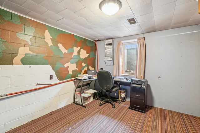carpeted office space featuring visible vents