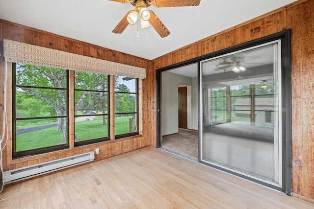 2591 Carver Ave E, Maplewood, MN 55119 - unfurnished sunroom with baseboard heating