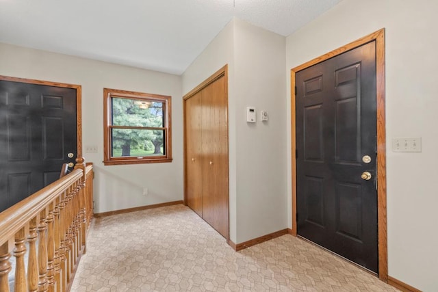 2591 Carver Ave E, Maplewood, MN 55119 - entrance foyer featuring baseboards
