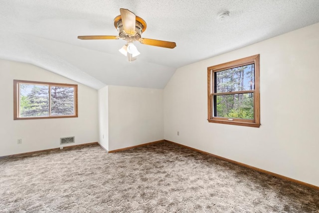 2591 Carver Ave E, Maplewood, MN 55119 - bonus room featuring carpet floors, baseboards, vaulted ceiling, and a ceiling fan