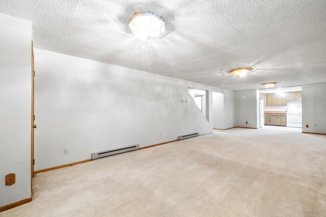 2591 Carver Ave E, Maplewood, MN 55119 - unfurnished living room featuring baseboard heating, a textured ceiling, light colored carpet, and baseboards