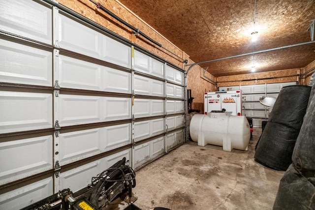 2591 Carver Ave E, Maplewood, MN 55119 - garage with freestanding refrigerator