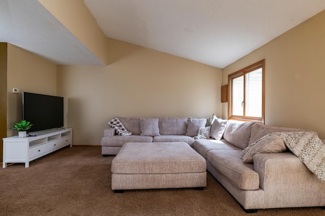 carpeted living room with vaulted ceiling