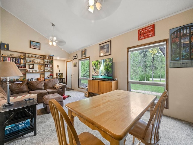 2595 Carver Ave E, Maplewood, MN 55119 - dining room featuring ceiling fan, light carpet, lofted ceiling, and crown molding
