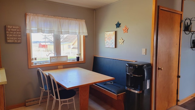 dining room featuring baseboards