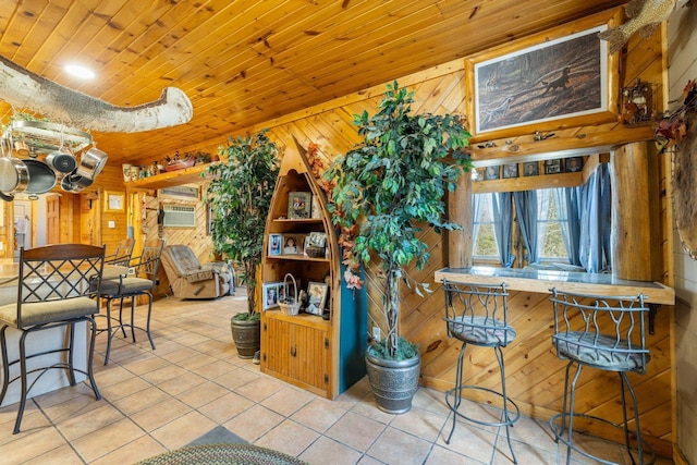 45570 Star Lake Rd, Marcell, MN 56657 - dining room with wooden ceiling, wood walls, a wall mounted AC, and tile patterned floors