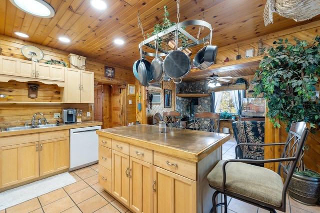 45570 Star Lake Rd, Marcell, MN 56657 - kitchen featuring a ceiling fan, recessed lighting, dishwasher, light tile patterned flooring, and a sink