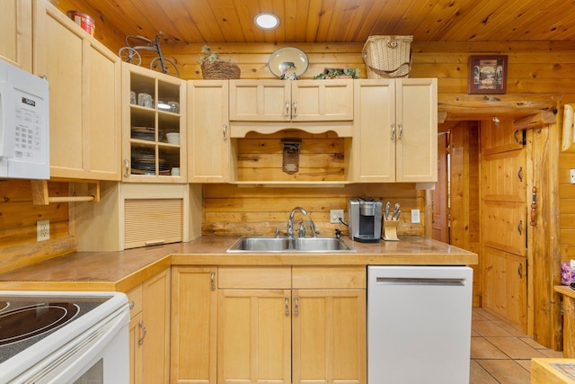 45570 Star Lake Rd, Marcell, MN 56657 - kitchen with wood ceiling, light brown cabinetry, a sink, white appliances, and light tile patterned flooring