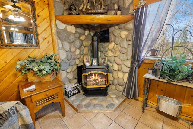 45570 Star Lake Rd, Marcell, MN 56657 - room details with a wood stove and wood walls