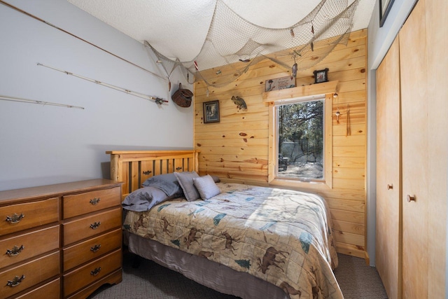 45570 Star Lake Rd, Marcell, MN 56657 - bedroom with wooden walls and a closet