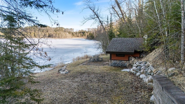 45570 Star Lake Rd, Marcell, MN 56657 - view of yard featuring an outbuilding, a forest view, and a shed
