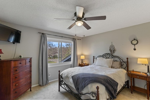 2915 Alvarado Ln N, Plymouth, MN 55447 - bedroom featuring light colored carpet, ceiling fan, a textured ceiling, and baseboards