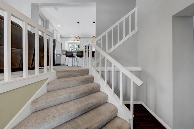 2915 Alvarado Ln N, Plymouth, MN 55447 - stairs featuring wood finished floors, baseboards, and recessed lighting
