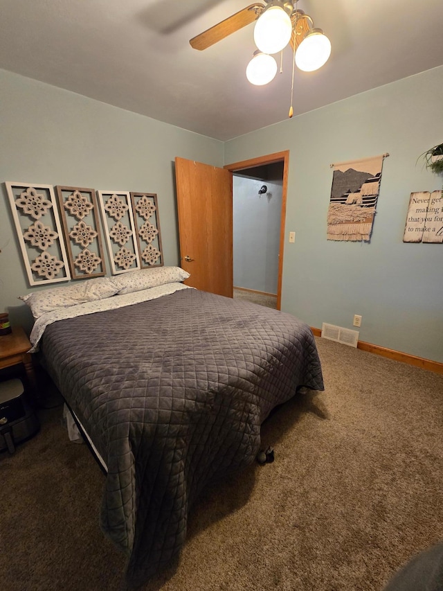 1014 3rd Ave SW, Pipestone, MN 56164 - carpeted bedroom with ceiling fan, baseboards, and visible vents