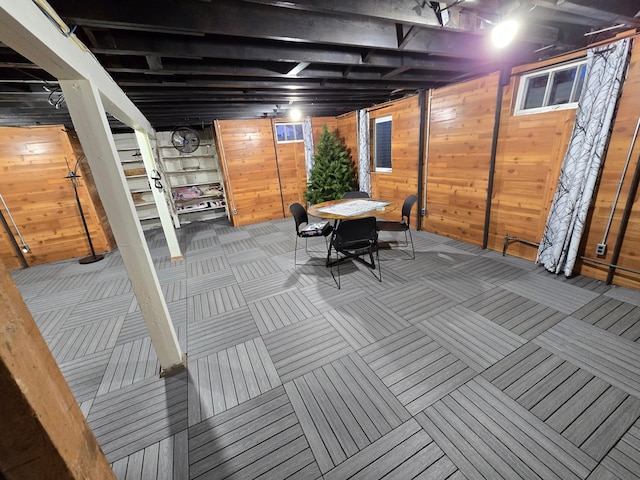 1014 3rd Ave SW, Pipestone, MN 56164 - unfinished below grade area featuring wooden walls and carpet