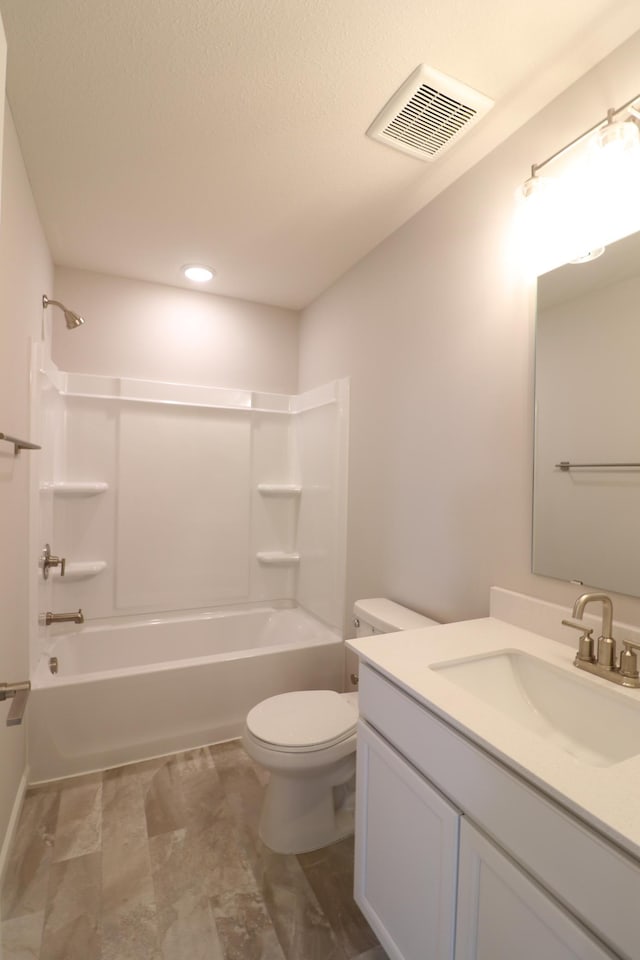 full bath with vanity, visible vents, recessed lighting, toilet, and shower / bathing tub combination