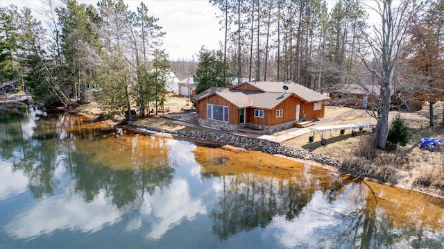 exterior space with a water view