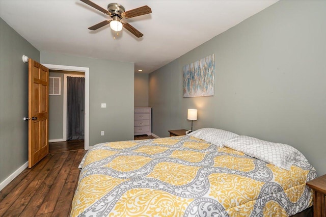 bedroom with baseboards, visible vents, ceiling fan, and dark wood-type flooring