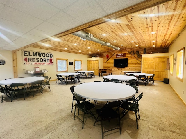 dining area featuring concrete flooring, visible vents, and recessed lighting