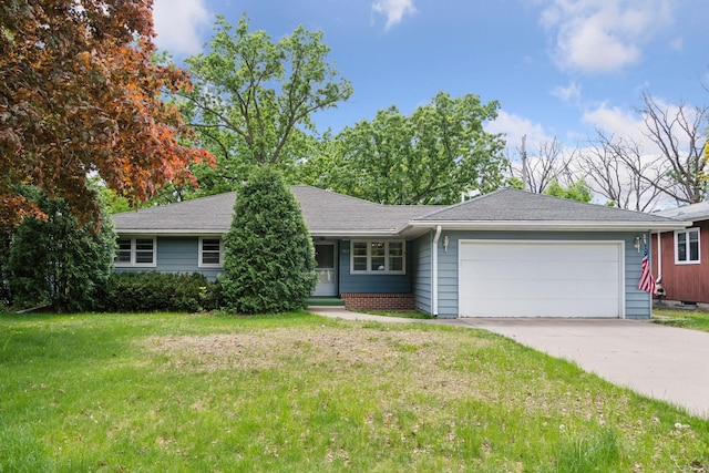 9017 31st St, Saint Louis Park, MN 55426 - ranch-style home featuring an attached garage, concrete driveway, and a front lawn