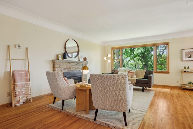 9017 31st St, Saint Louis Park, MN 55426 - living area with wood finished floors and a stone fireplace