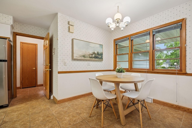 9017 31st St, Saint Louis Park, MN 55426 - dining room featuring wallpapered walls, a chandelier, and light tile patterned flooring