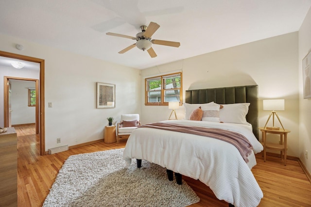 9017 31st St, Saint Louis Park, MN 55426 - bedroom featuring wood finished floors and ceiling fan