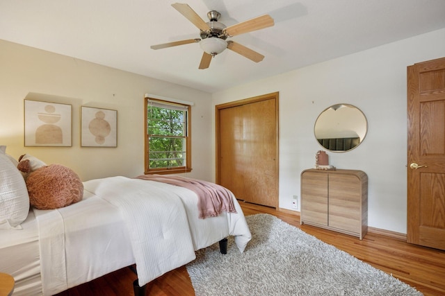 9017 31st St, Saint Louis Park, MN 55426 - bedroom with wood finished floors, a closet, and ceiling fan