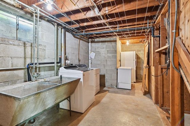 9017 31st St, Saint Louis Park, MN 55426 - unfinished basement featuring independent washer and dryer, fridge, and freestanding refrigerator