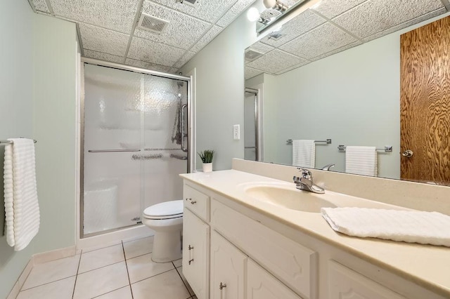 211 Mckinley St, Anoka, MN 55303 - full bath with toilet, tile patterned floors, a stall shower, and vanity