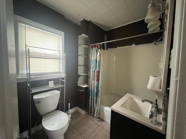 full bathroom with shower / bath combo, tile patterned floors, a sink, and toilet