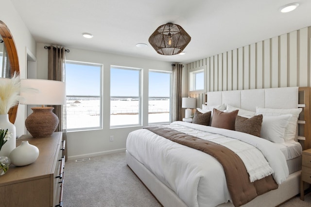 carpeted bedroom with baseboards, visible vents, and recessed lighting