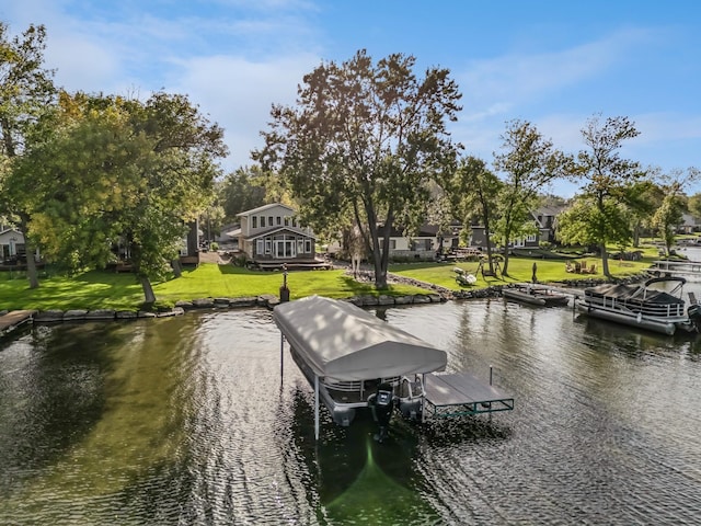 1867 Beach Dr SE, Forest Lake, MN 55025 - dock area featuring boat lift, a water view, and a yard