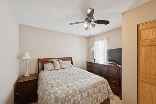 1867 Beach Dr SE, Forest Lake, MN 55025 - bedroom with a textured ceiling, ceiling fan, and light carpet