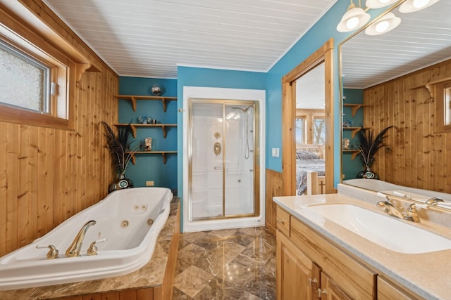 1867 Beach Dr SE, Forest Lake, MN 55025 - full bathroom featuring wood walls, marble tiled floors, a shower stall, vanity, and a whirlpool tub