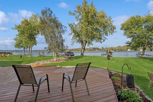 1867 Beach Dr SE, Forest Lake, MN 55025 - deck featuring a water view and a yard