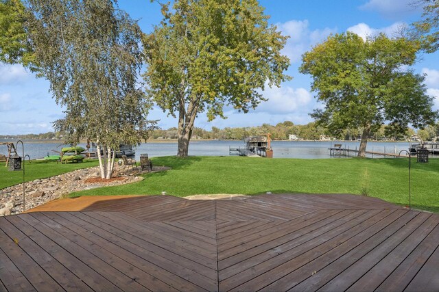 1867 Beach Dr SE, Forest Lake, MN 55025 - wooden deck featuring a water view and a lawn