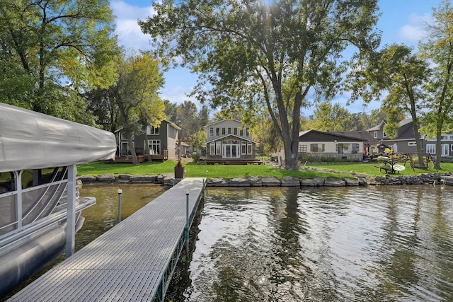 1867 Beach Dr SE, Forest Lake, MN 55025 - dock with a water view and a yard